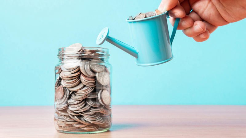 a person saving coins