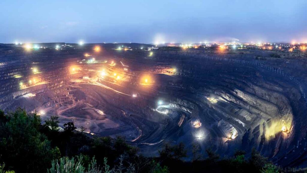 open pit mining at night
