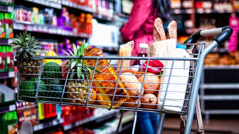 a shopping cart full of consumer goods