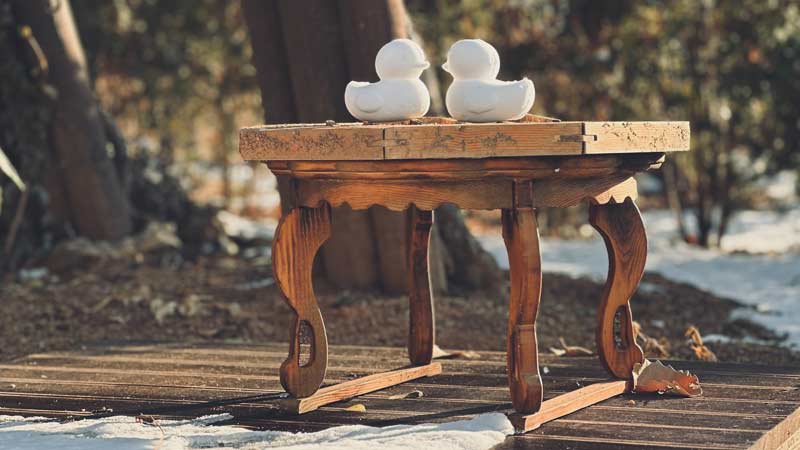 an old wooden table outdoors