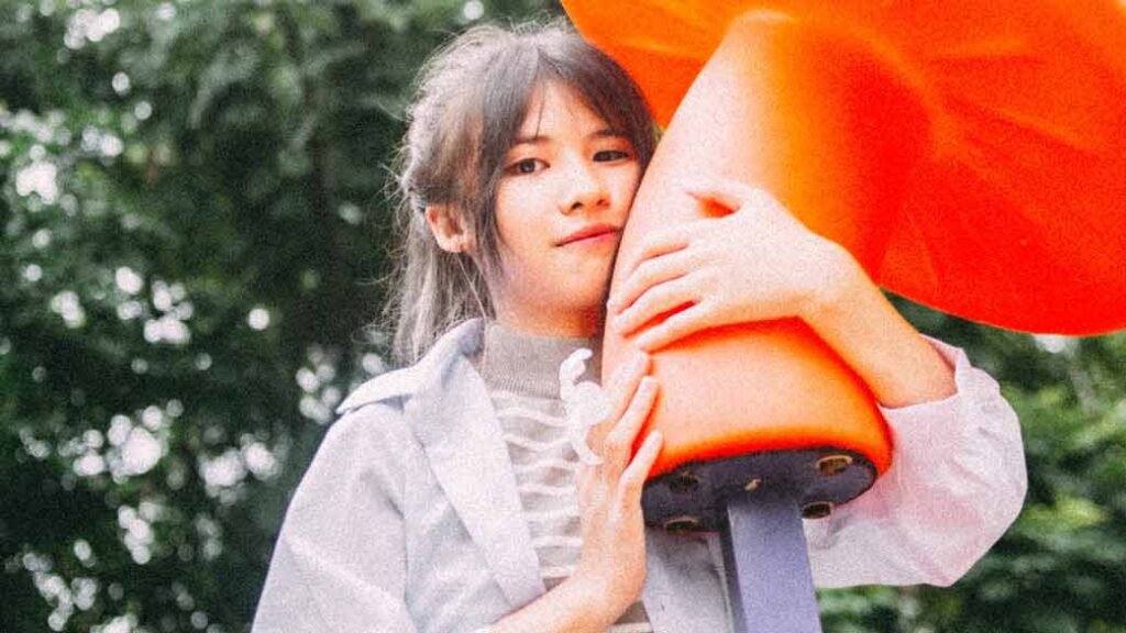 a girl feeling content in a park