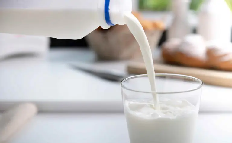 milk pouring into a glass.