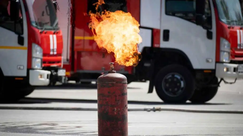 a dangerous gas bottle on fire
