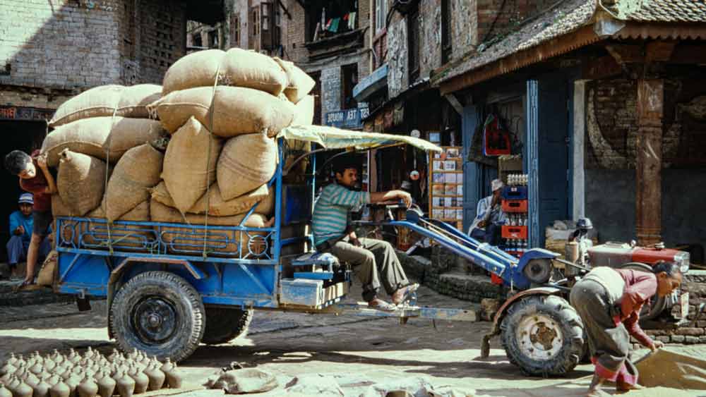 a man transporting goods
